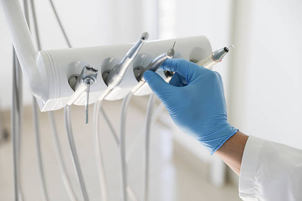 Professional Tooth Extraction technician working in Caldwell, NJ